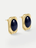 Veronica Beard Gold stud earrings with oval blue lapis stones.