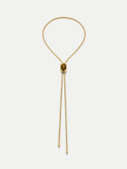 Veronica Beard Gold snake chain necklace with oval center bead.