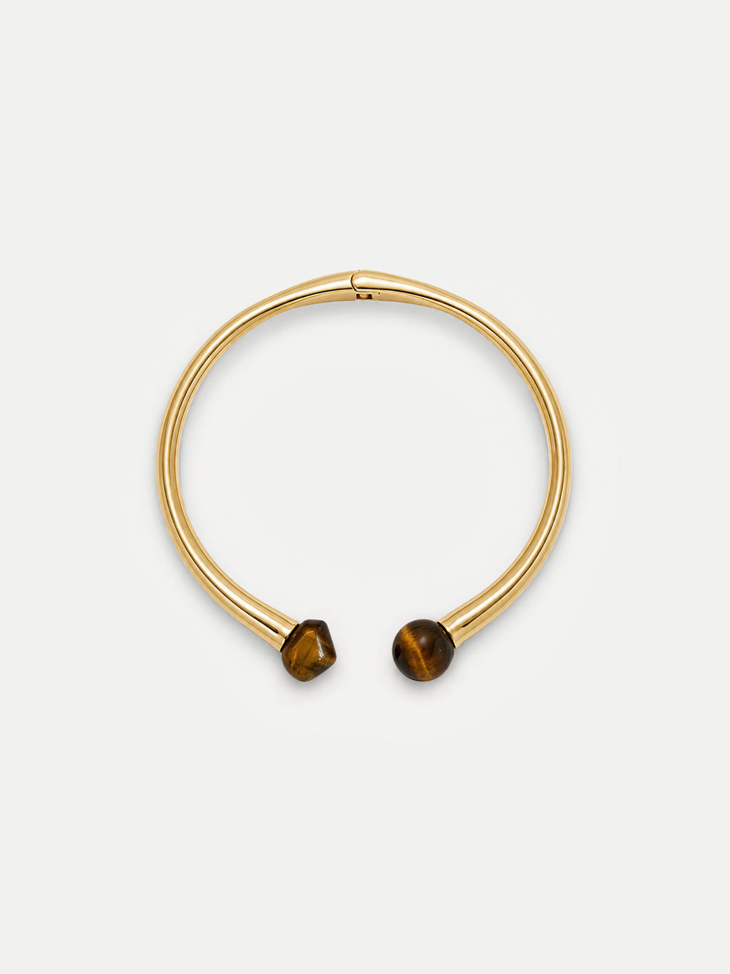 Veronica Beard Gold bangle bracelet with brown tiger's eye stones.