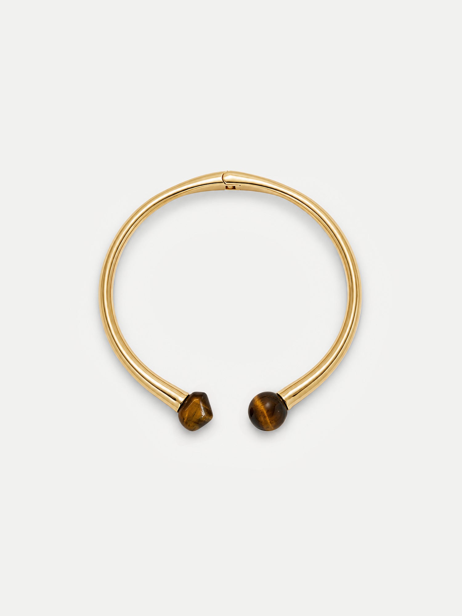 Veronica Beard Gold bangle bracelet with brown tiger's eye stones.