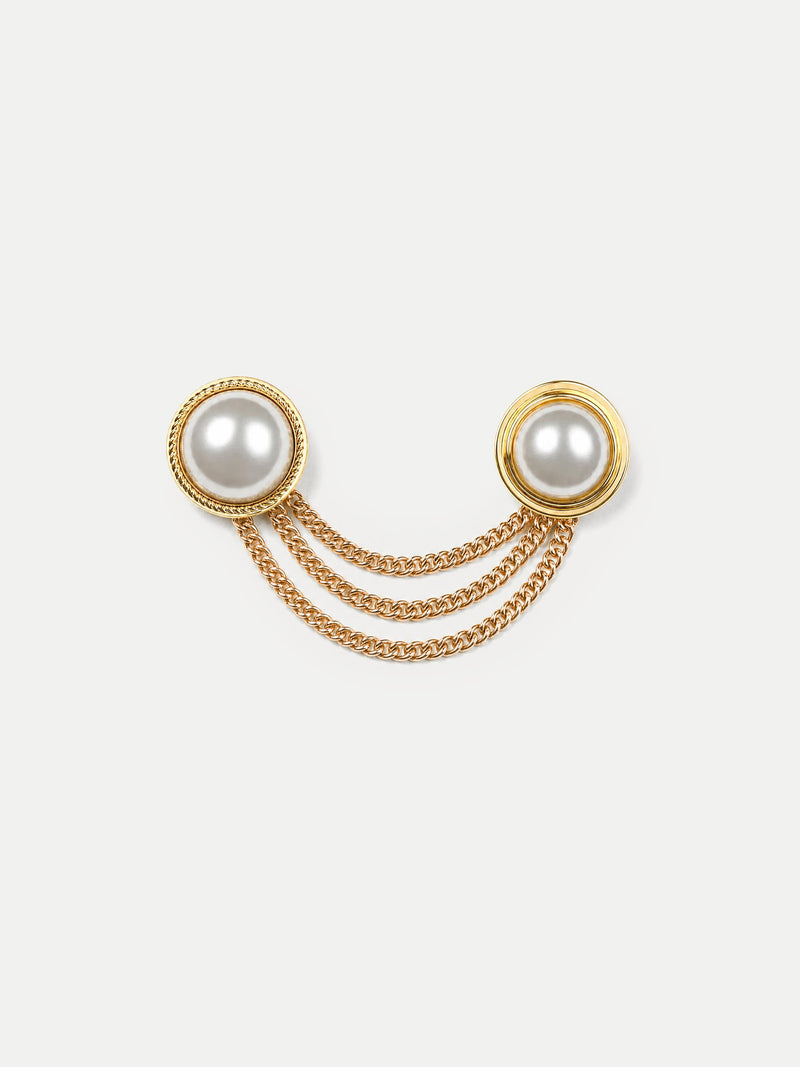 Veronica Beard Gold triple chain brooch with two white pearls.