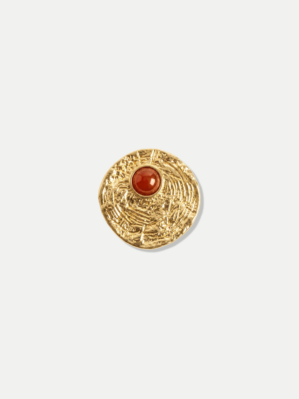 Veronica Beard Textured gold round brooch with red stone.