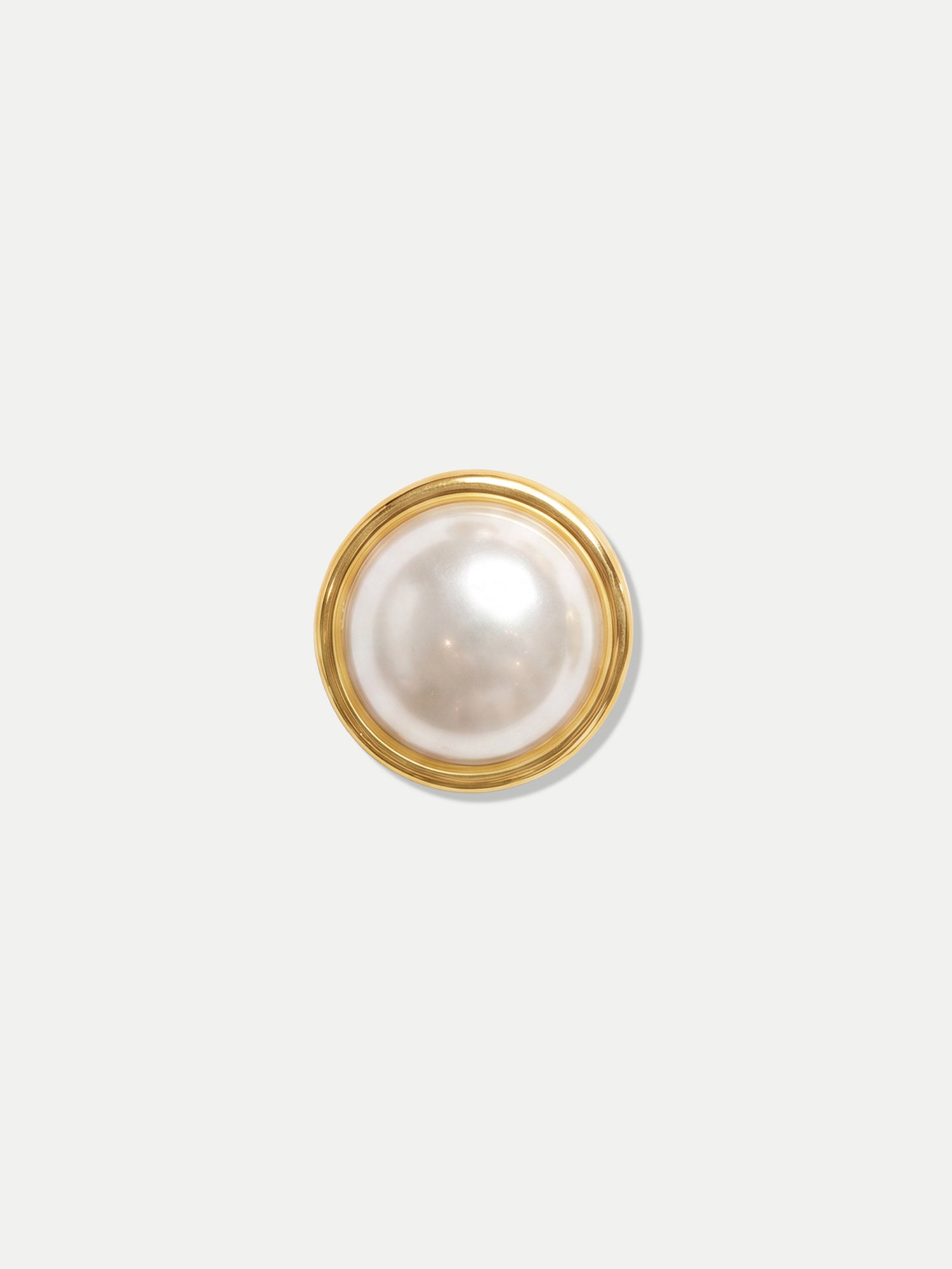 Veronica Beard Round gold and white faux pearl button.