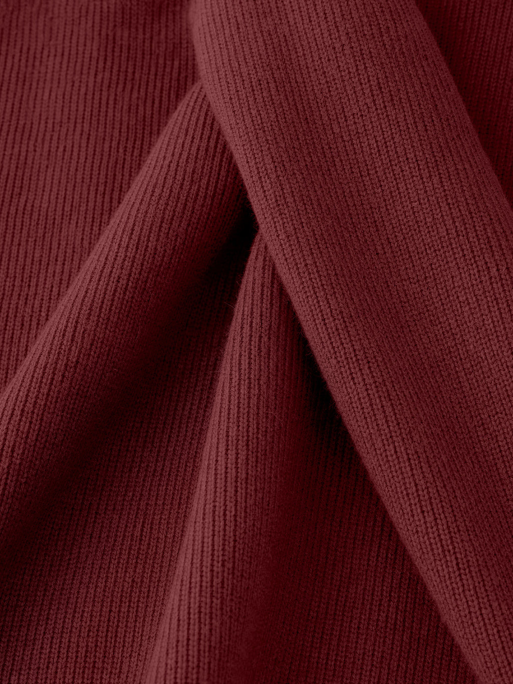 Veronica Beard Burgundy ribbed knit sweater fabric close up.