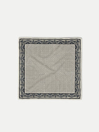 Veronica Beard White silk pocket square with black and purple geometric pattern.