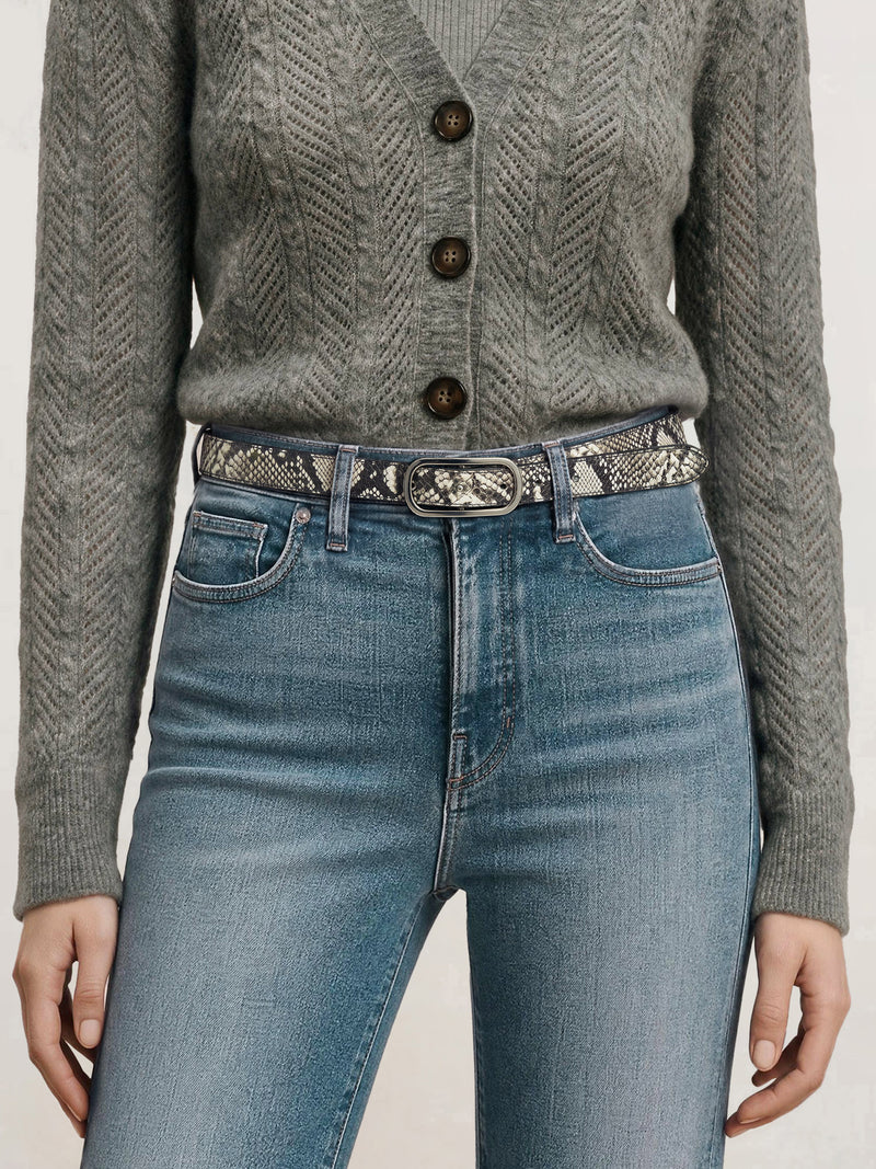 Veronica Beard Gray cable knit cardigan, blue jeans, snakeskin belt.