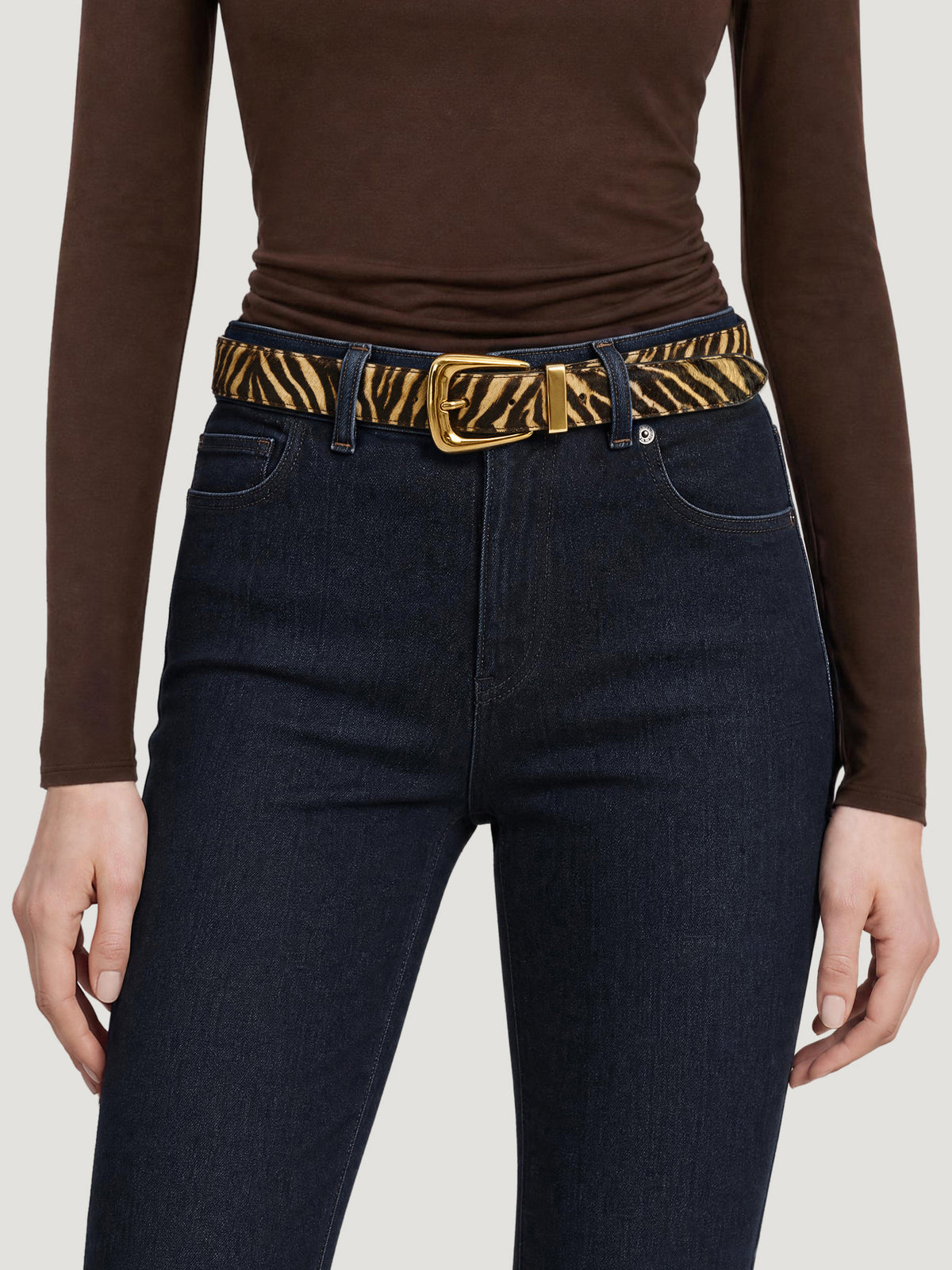 Veronica Beard Zebra print calf hair belt with gold buckle.