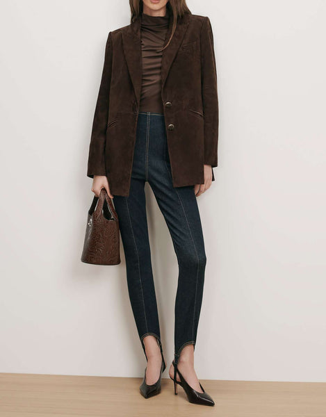 Veronica Beard Brown suede blazer, brown turtleneck, dark wash stirrup leggings.