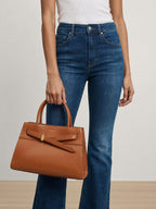 Veronica Beard Brown leather satchel with a bow detail.