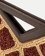 Veronica Beard Brown and beige woven raffia tote bag with a dark brown leather triangular handle.