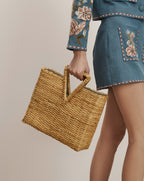 Veronica Beard Blue denim jacket and skirt set with floral embroidery and white stitching.
