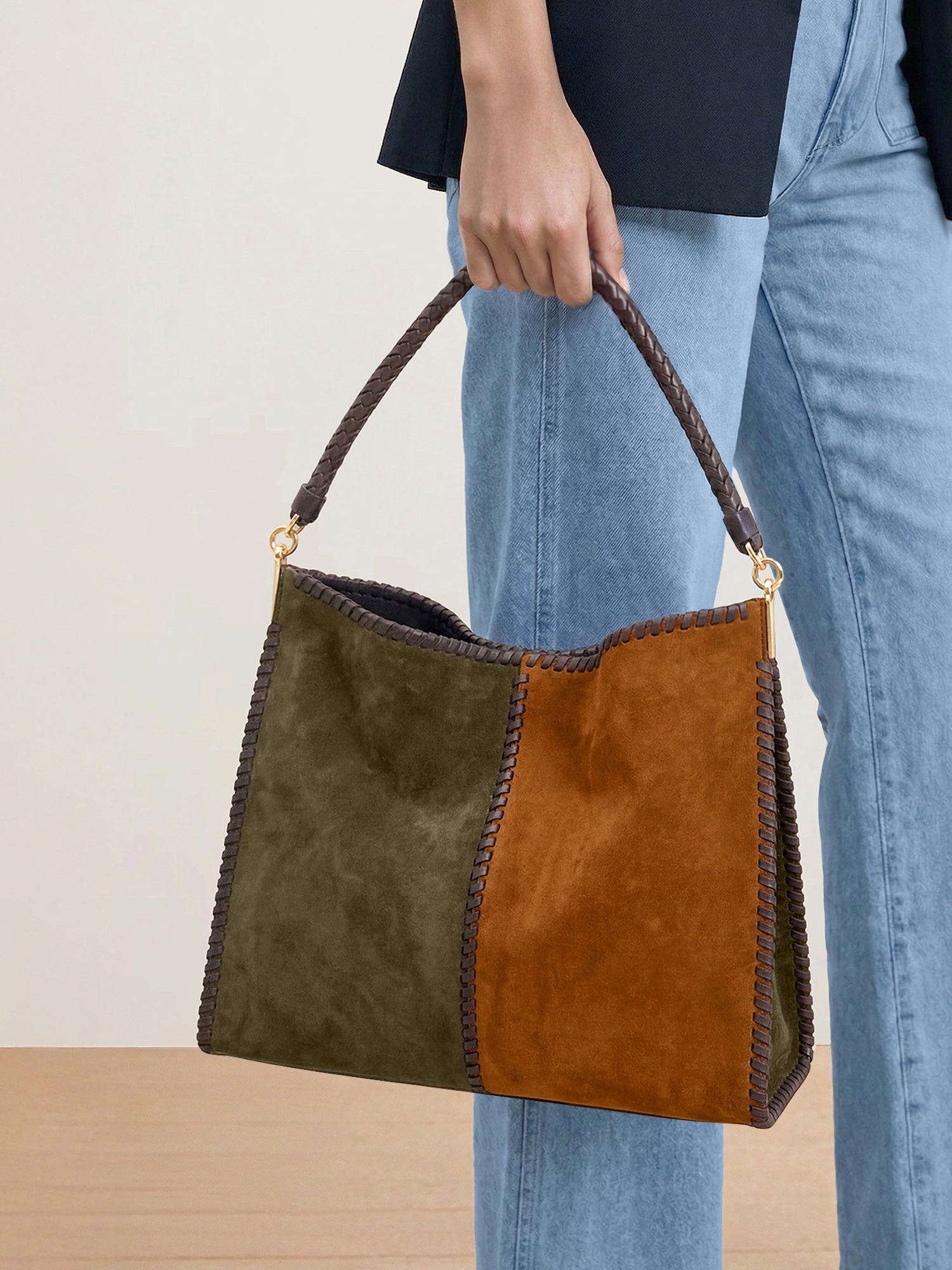 Veronica Beard Two-tone suede shoulder bag with braided leather handle.