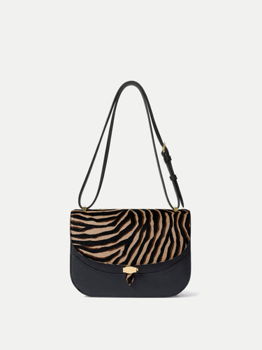 Veronica Beard Black leather and zebra print calf hair shoulder bag.
