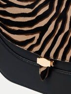 Veronica Beard Black and zebra-print leather shoulder bag.