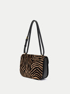 Veronica Beard Zebra print calf hair and black leather shoulder bag.