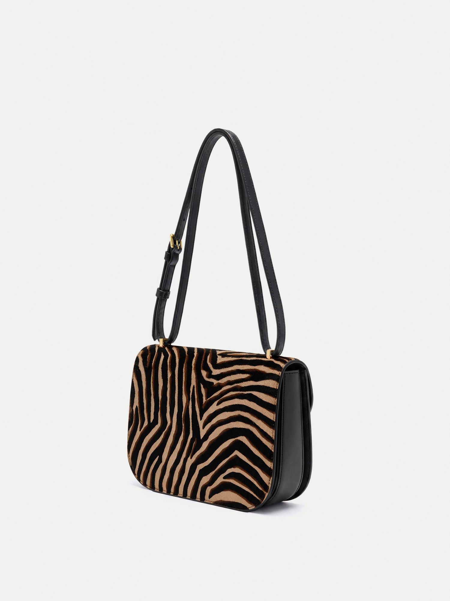 Veronica Beard Zebra print calf hair and black leather shoulder bag.