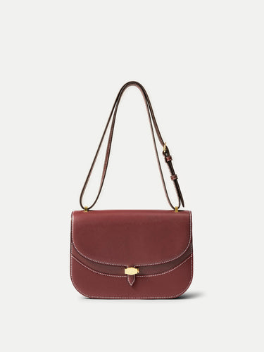 Veronica Beard Burgundy leather shoulder bag with gold hardware.