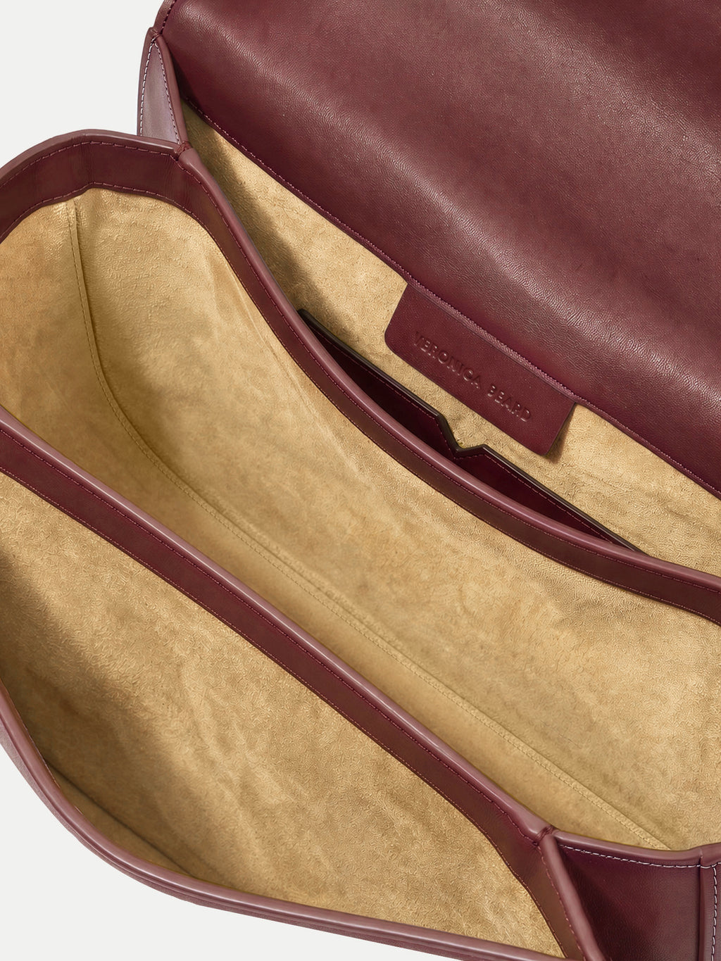 Veronica Beard Maroon leather structured handbag interior with suede lining.