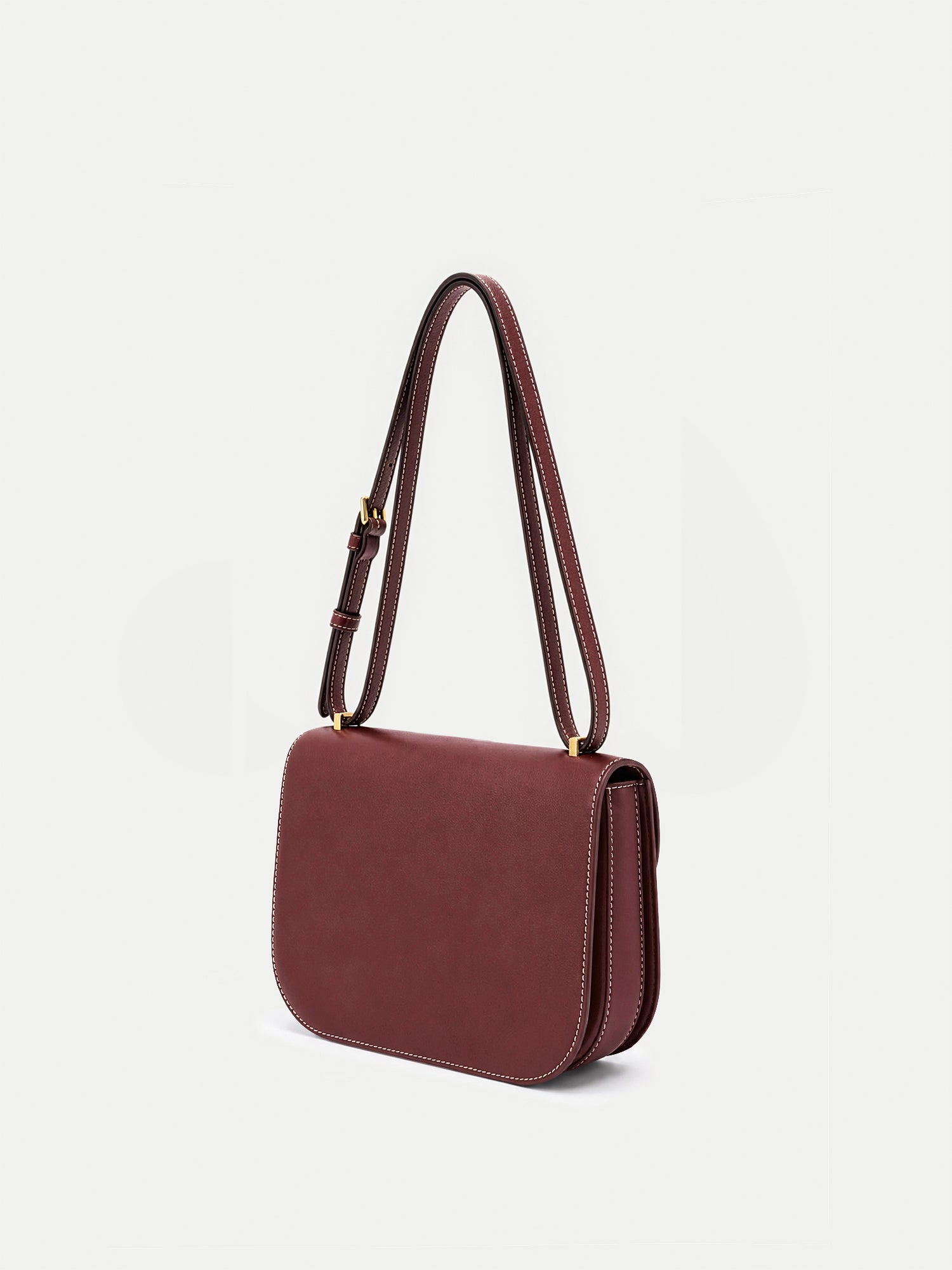 Veronica Beard Burgundy leather structured crossbody handbag with white stitching.