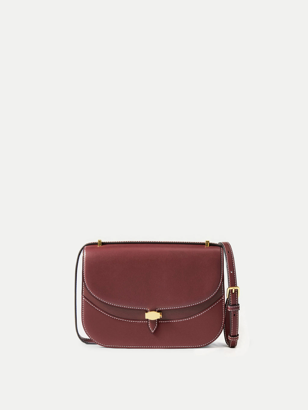 Veronica Beard Burgundy leather saddle bag with gold clasp.