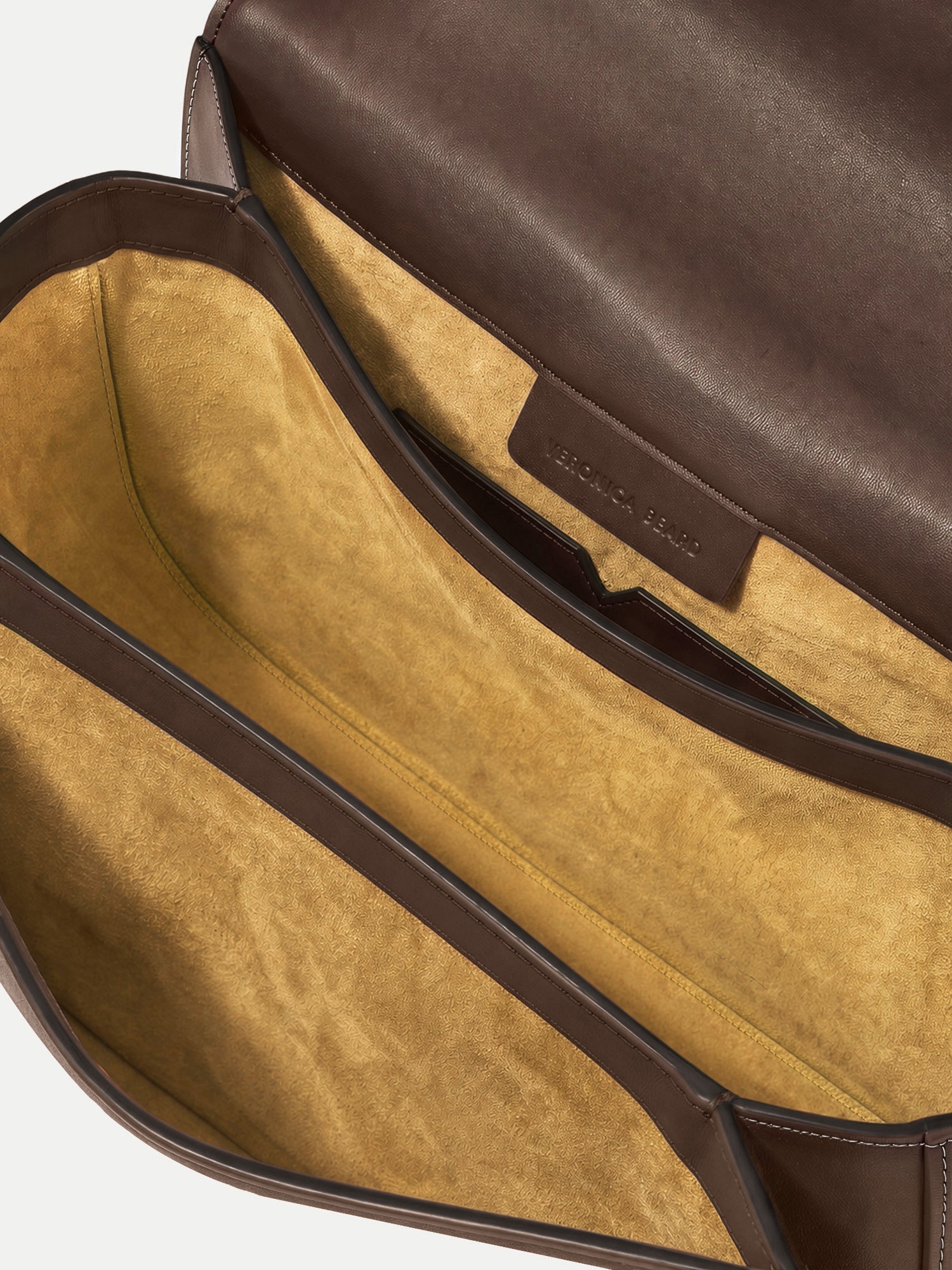 Veronica Beard Brown leather handbag with yellow suede interior compartments.