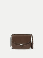 Veronica Beard Brown leather structured crossbody bag with white stitching.