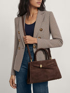 Veronica Beard Brown suede handbag with structured top handle.