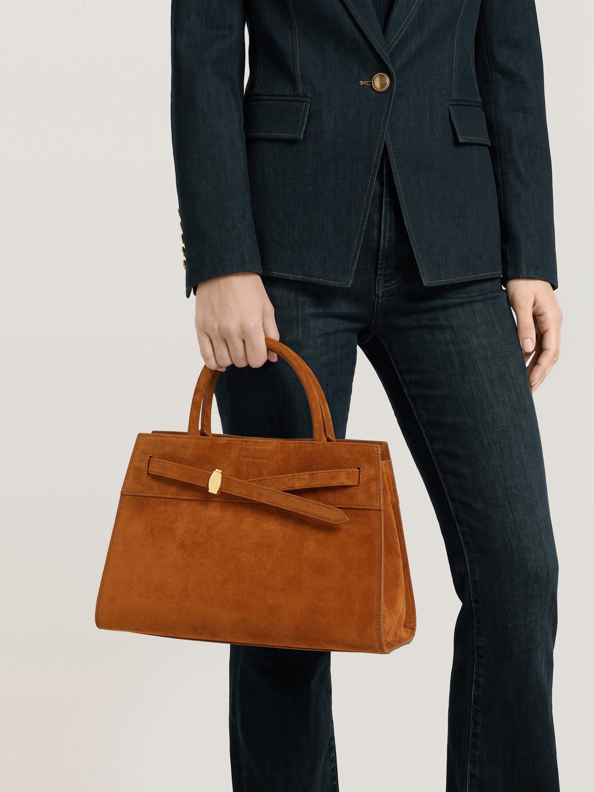 Veronica Beard Brown suede structured handbag with gold clasp.