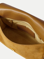 Veronica Beard Tan leather shoulder bag with suede interior.