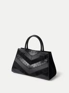 Veronica Beard Black leather and suede chevron handbag.