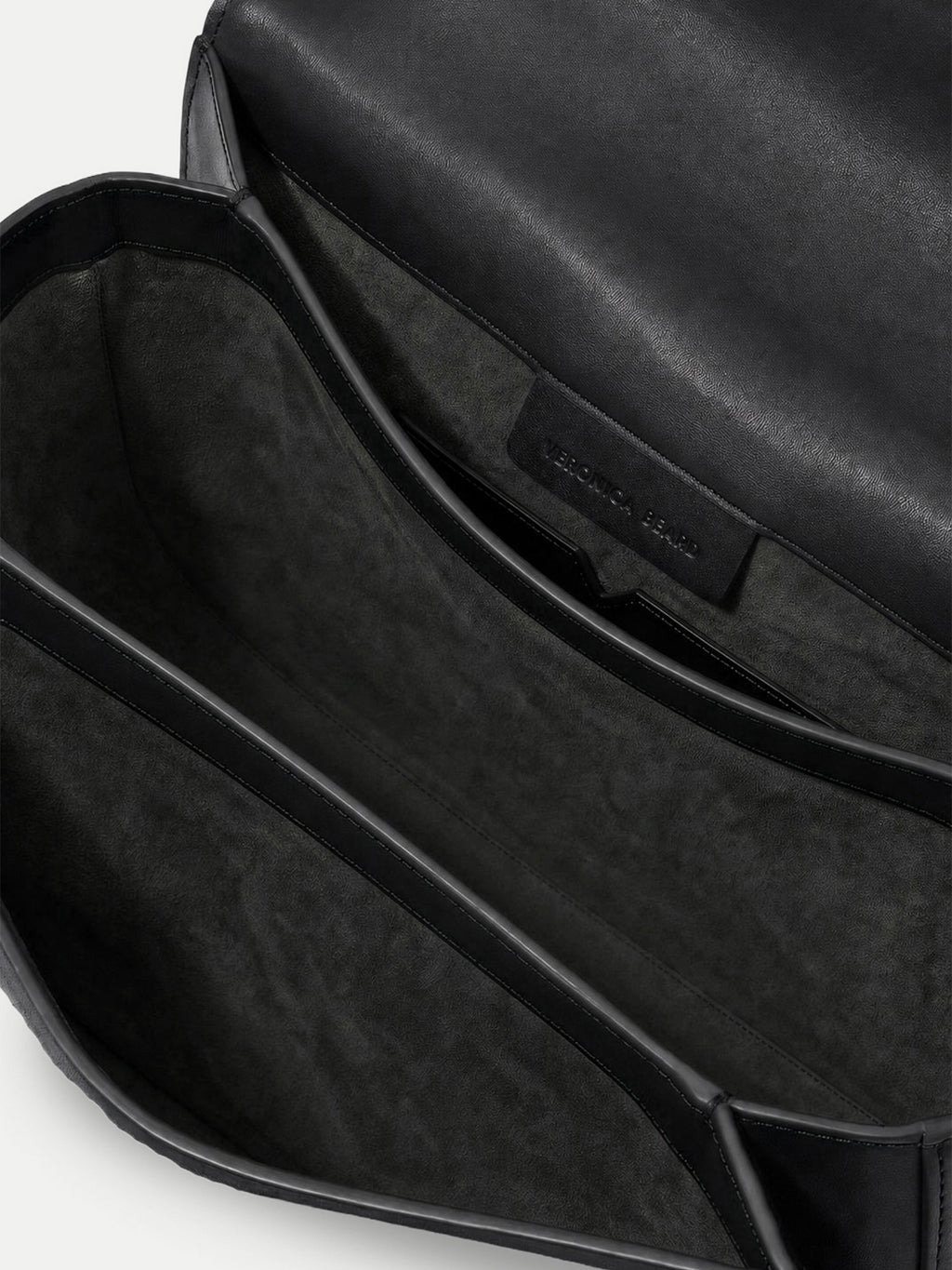 Veronica Beard Black leather shoulder bag interior with suede lining.