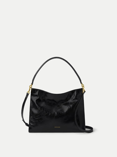 Veronica Beard Black patent leather shoulder bag with gold hardware.