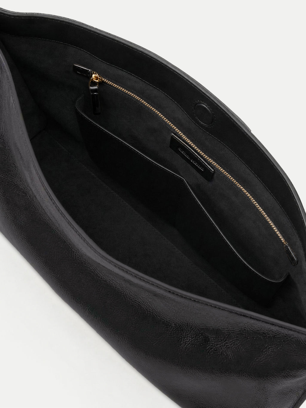 Veronica Beard Black leather handbag interior with zipper pocket.