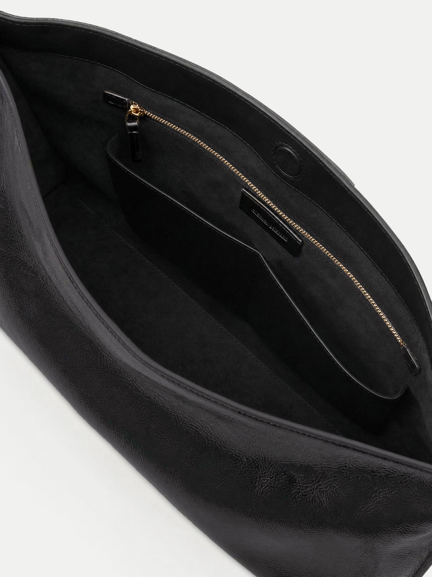 Veronica Beard Black leather handbag interior with zipper pocket.