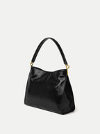 Veronica Beard Black patent leather structured shoulder bag.
