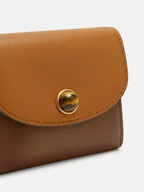 Veronica Beard Brown and tan leather wallet with a tiger's eye snap.