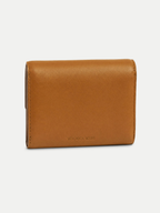 Veronica Beard Brown leather wallet with Veronica Beard logo.