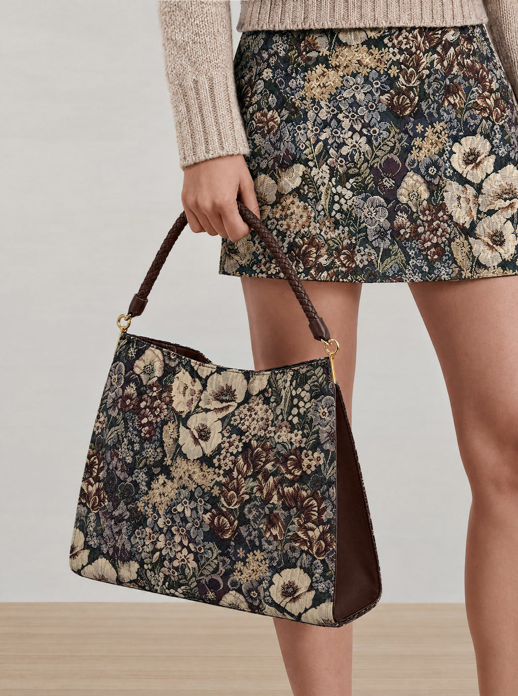 Veronica Beard Floral tapestry shoulder bag with braided brown strap.