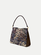 Veronica Beard Floral tapestry shoulder bag with braided strap.