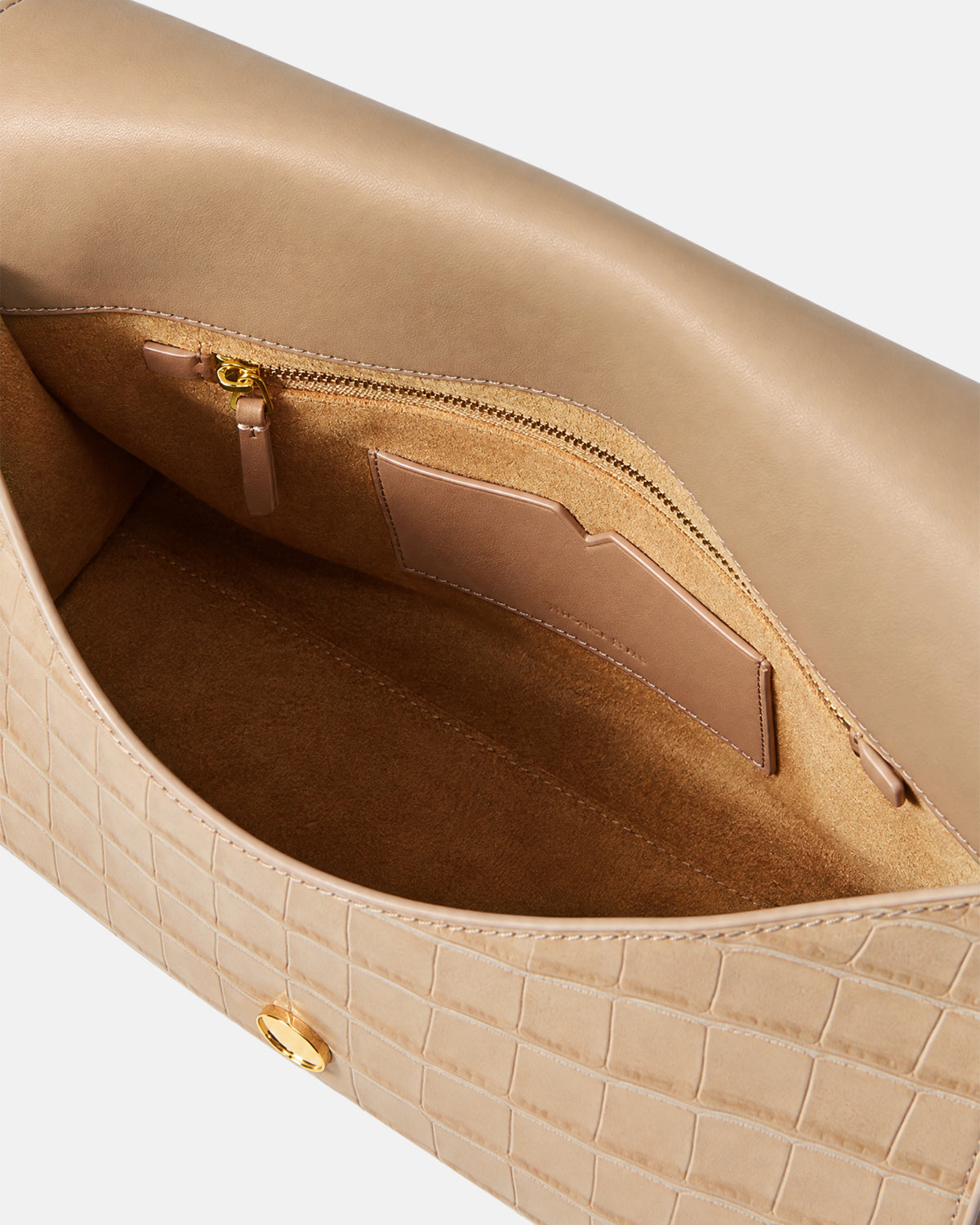 Veronica Beard Beige embossed leather handbag with suede interior.