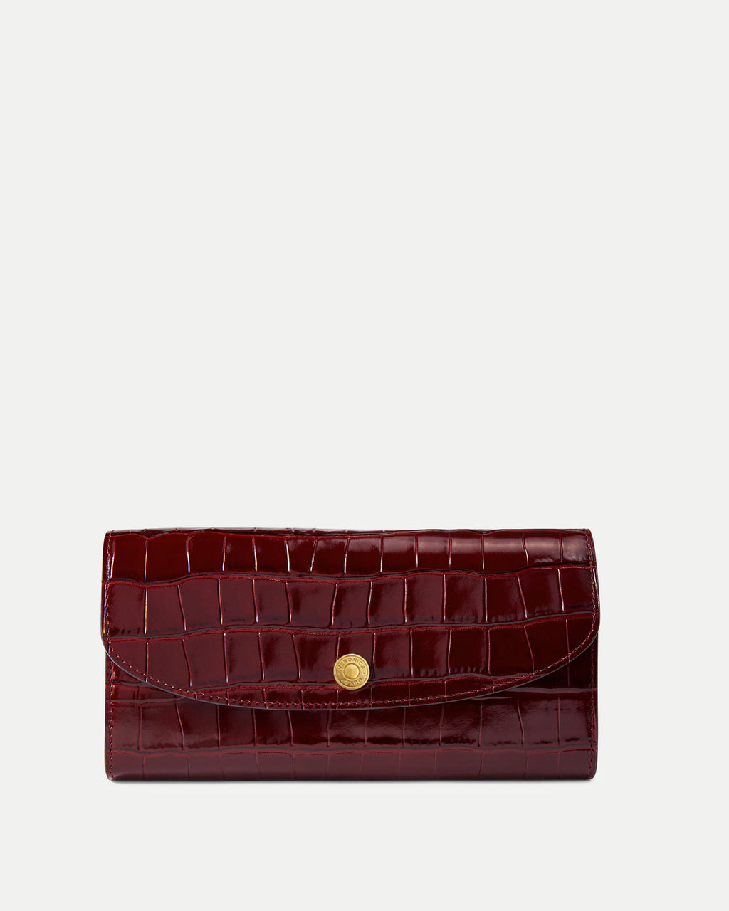 Veronica Beard Glossy red embossed crocodile leather wallet with snap closure.