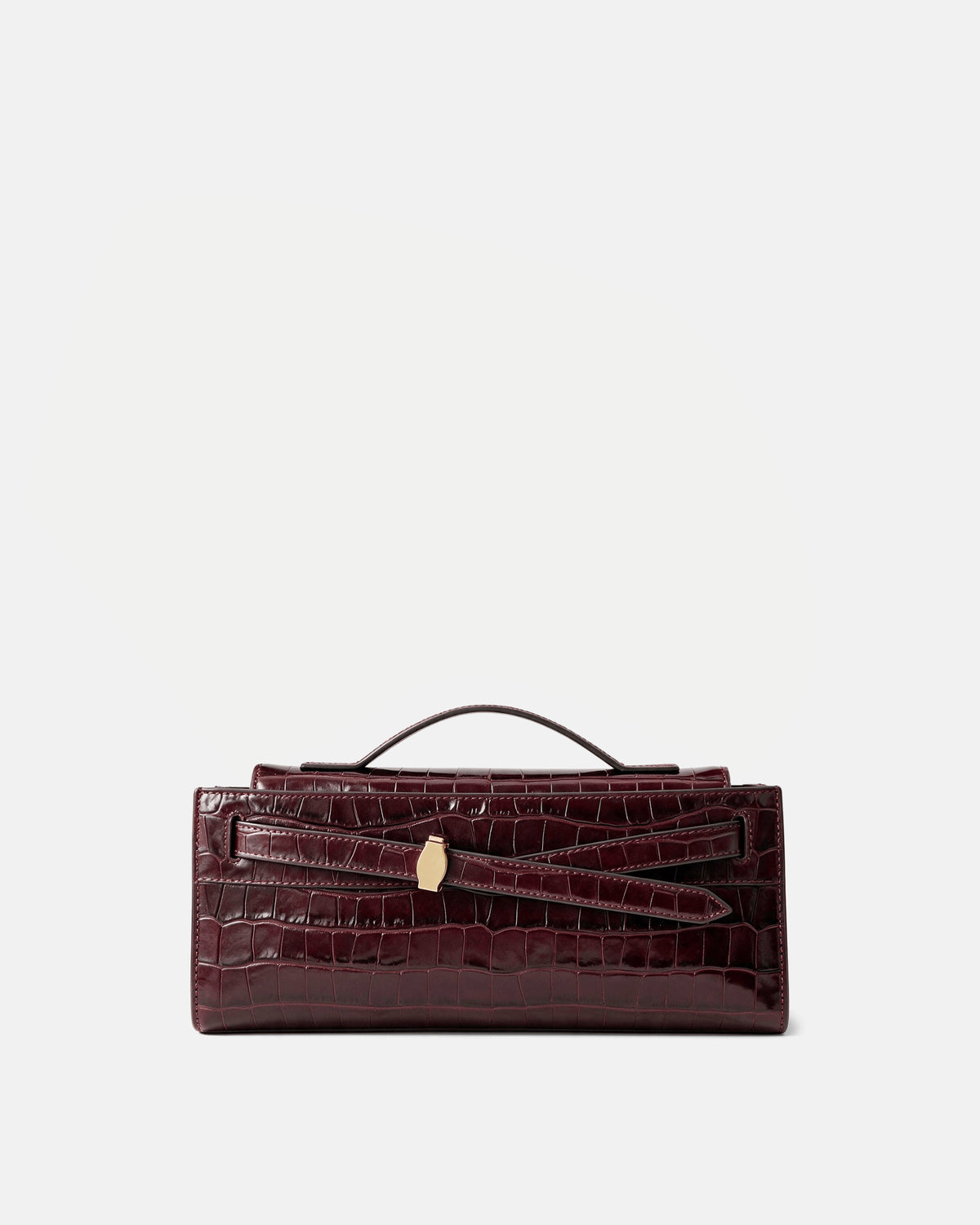 Veronica Beard Burgundy crocodile-embossed leather structured handbag with handle.