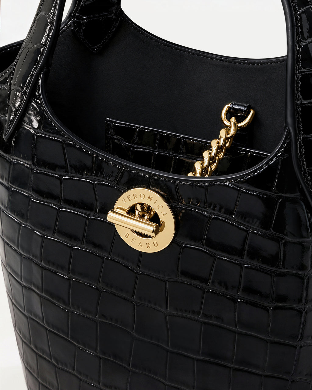 Veronica Beard Black embossed leather handbag with gold-tone hardware.