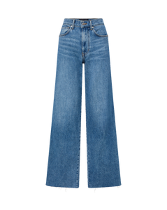 Veronica Beard Blue denim wide-leg jeans with frayed hem.