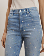 Veronica Beard Light wash denim jeans with scattered pearl and blue crystal embellishments.