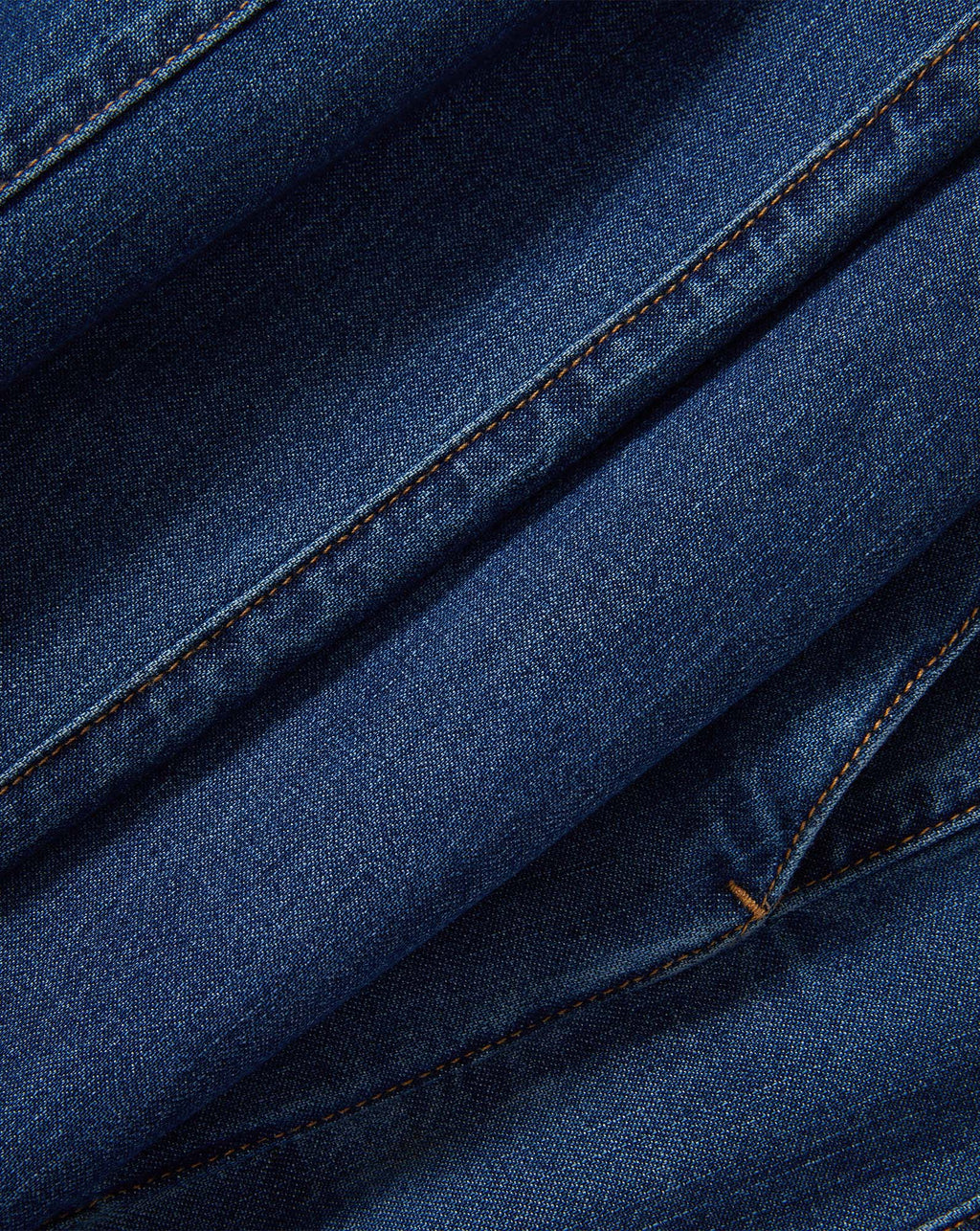 Veronica Beard Blue denim pant with tan stitching.