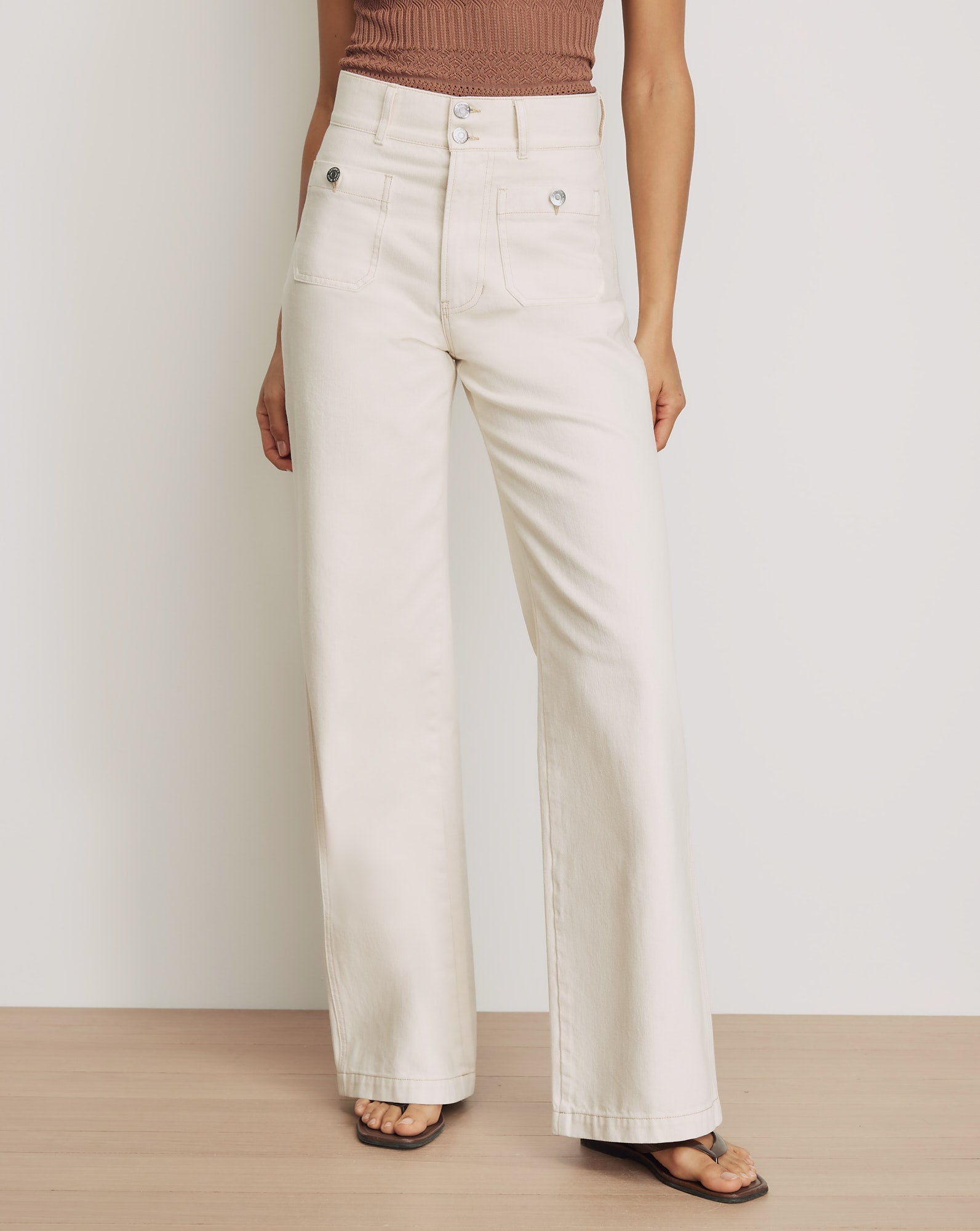 Veronica Beard Ecru wide-leg jeans with patch pockets.