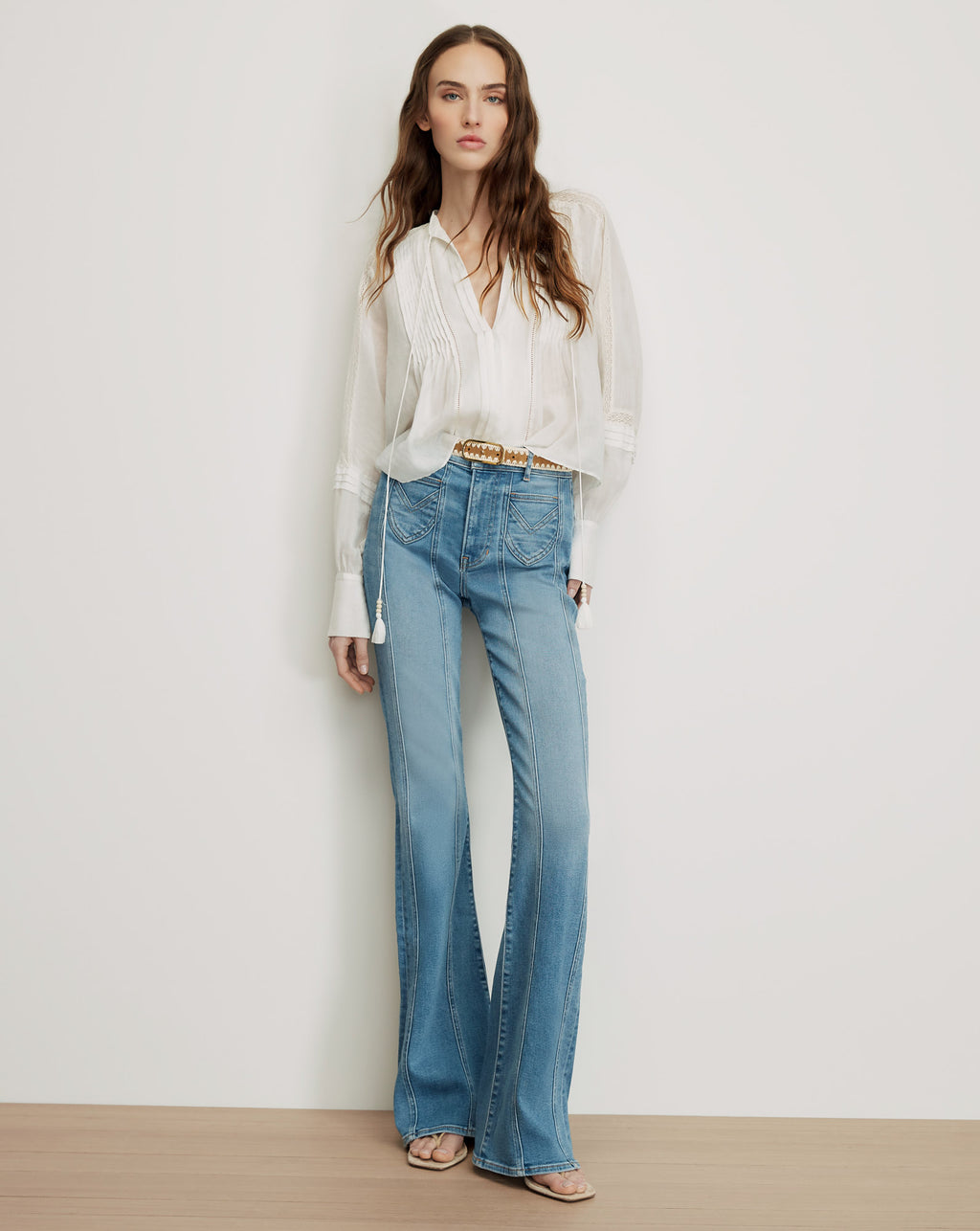 Veronica Beard Blue flared jeans with front seams.