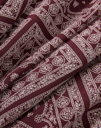 Veronica Beard Maroon bandana print fabric with white paisley pattern.