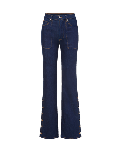Veronica Beard Dark blue flared jeans with side button details.